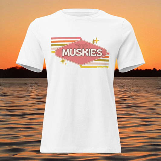 Retro Muskie Sign t-shirt featuring vintage pink and yellow badge graphic with musky fish illustration, lake sunset background