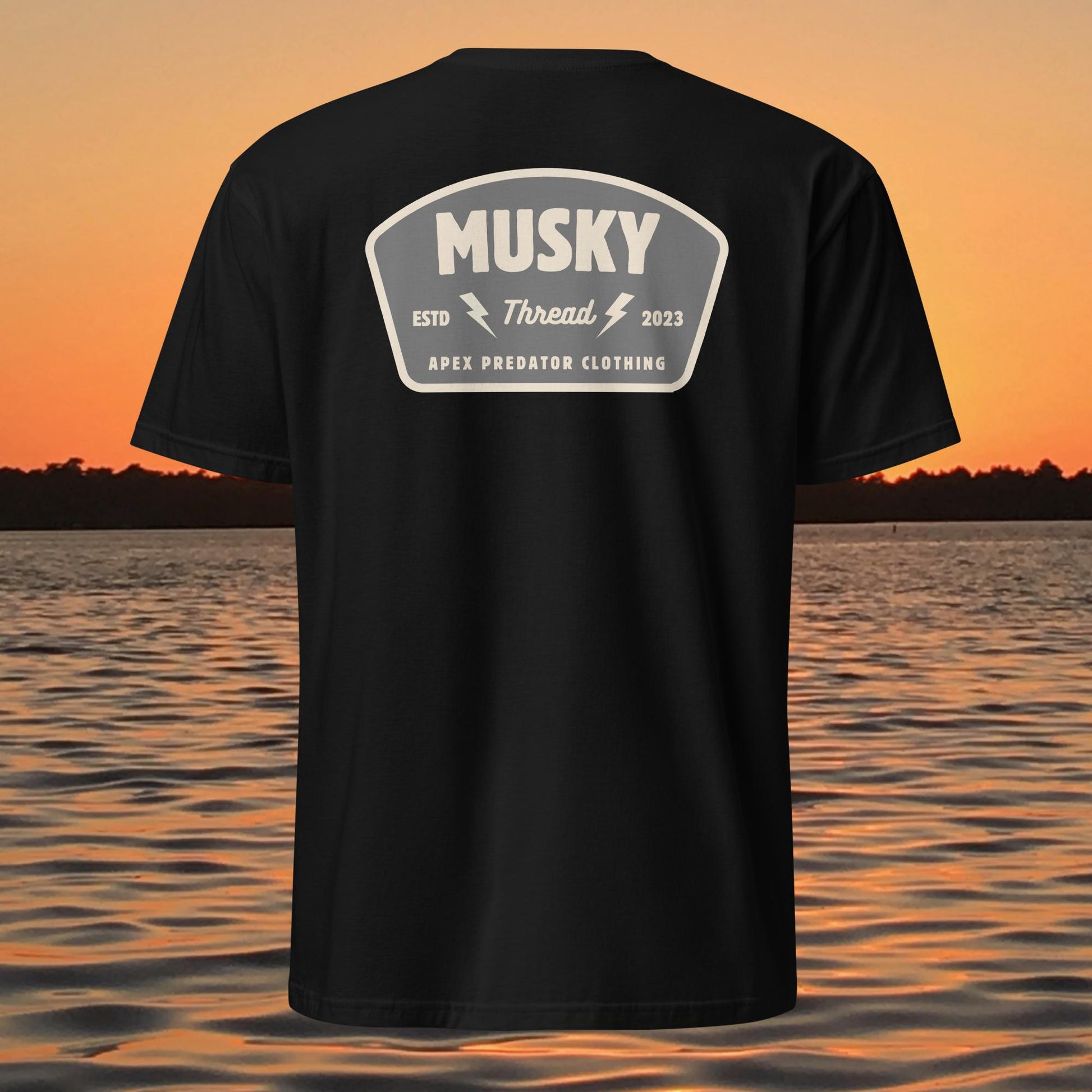t shirt with musky thread apex predator badge style design on back
