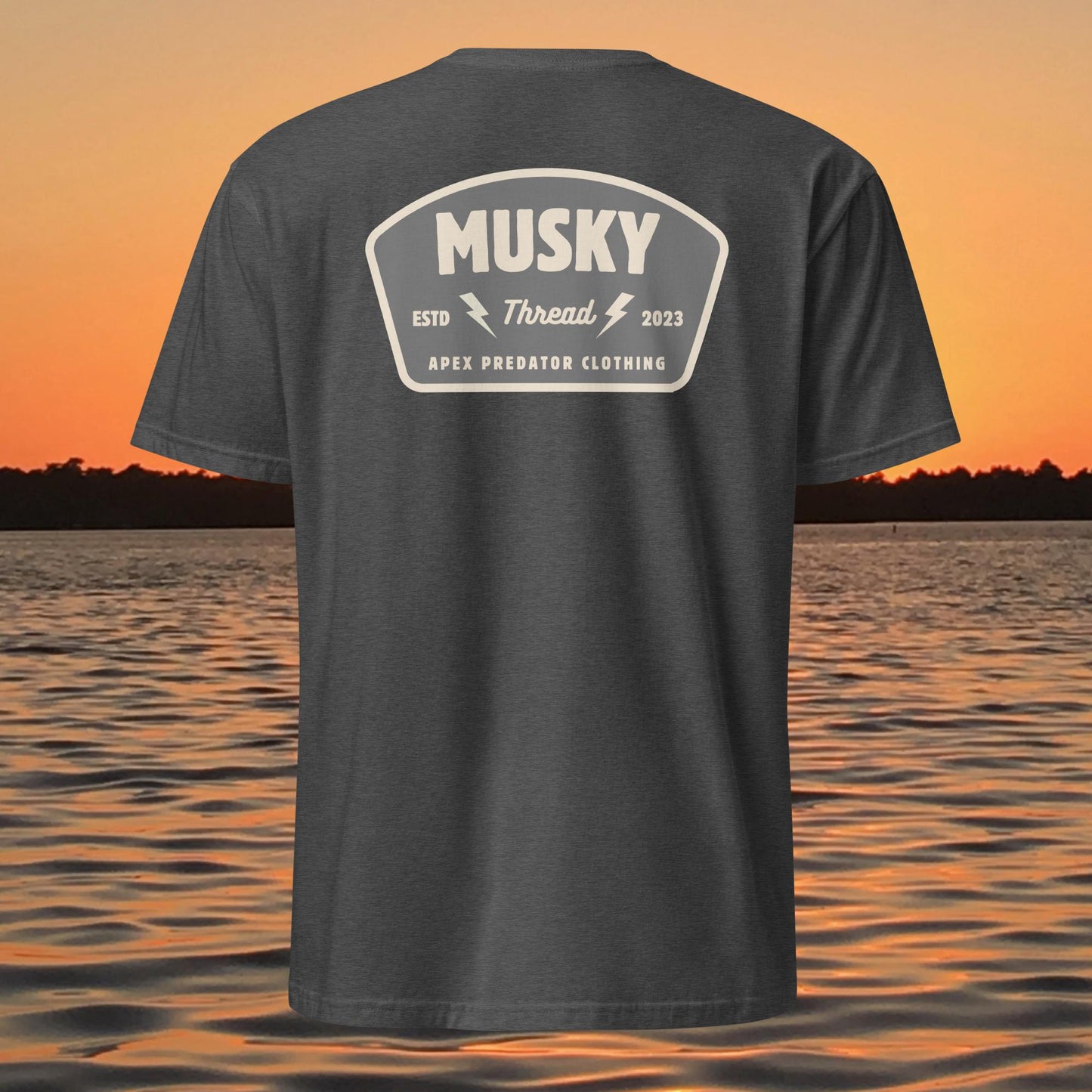 t shirt with musky thread apex predator badge style design on back
