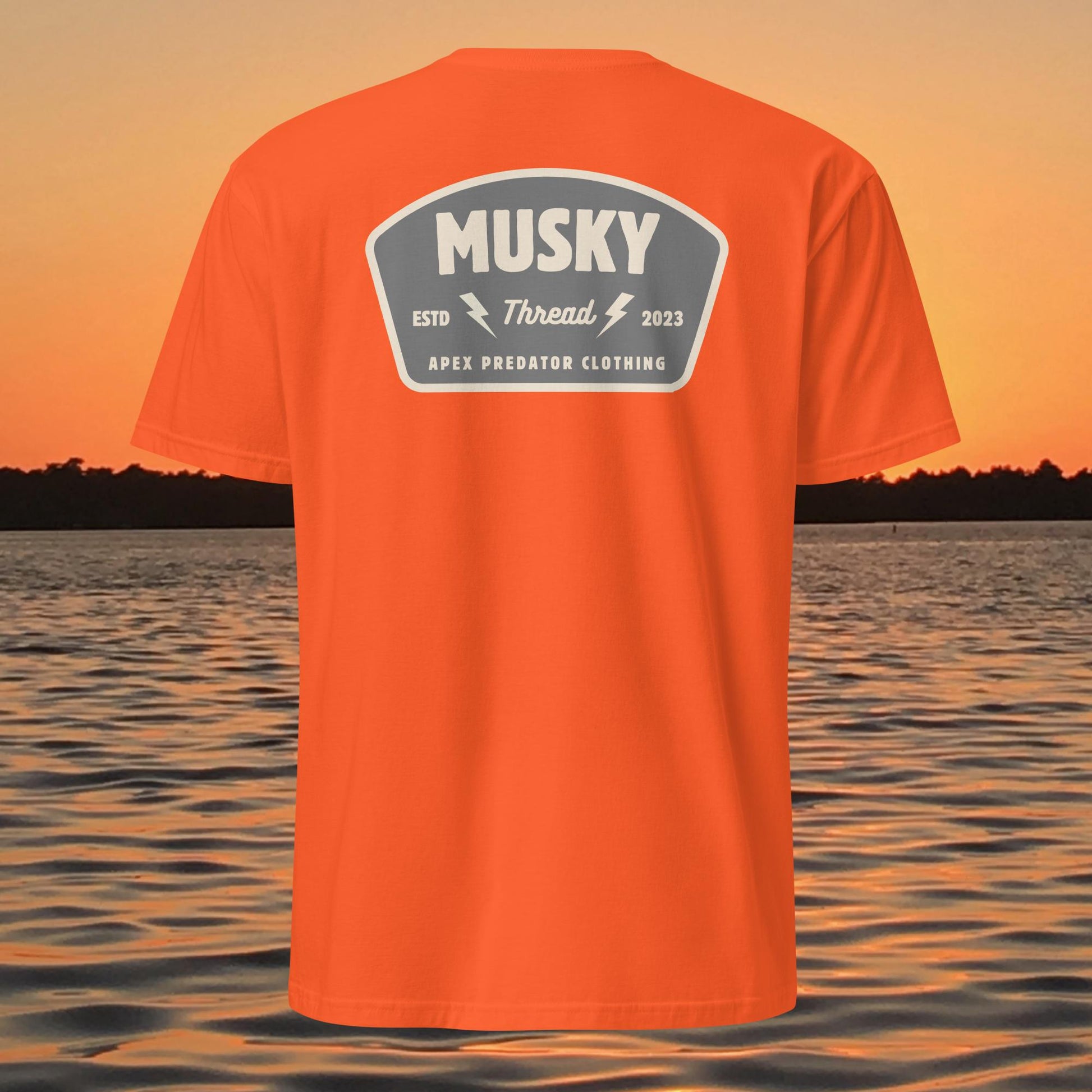 t shirt with musky thread apex predator badge style design on back
