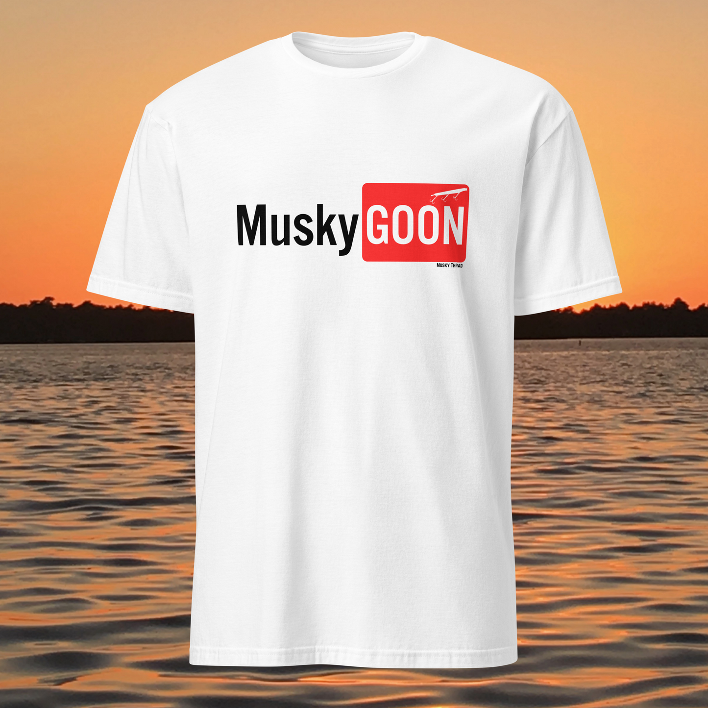 unisex t-shirt with "Musky GOON" text logo, lake sunset background