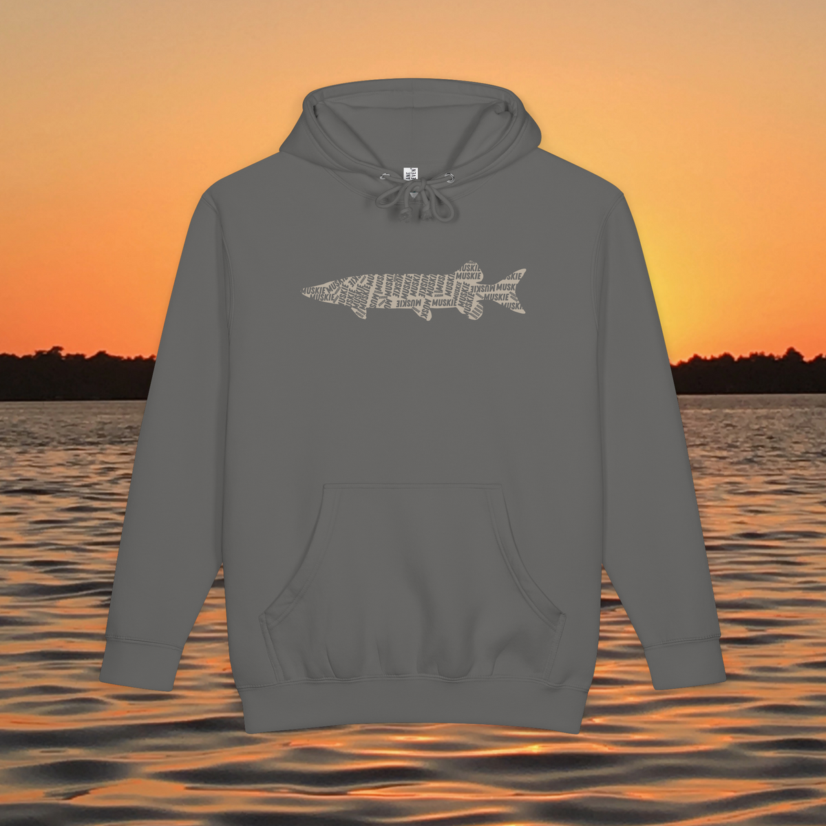 Muskie Lives Within Us black heavyweight hoodie with tan MUSKIE word art fish silhouette over sunset lake
