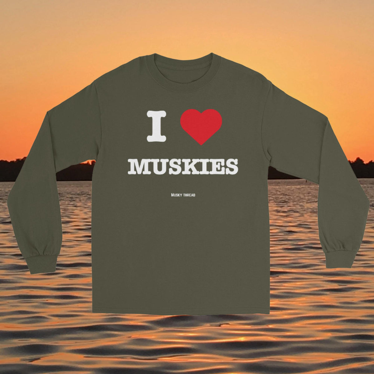 I Love Muskies long sleeve shirt with red heart design over a lake sunset