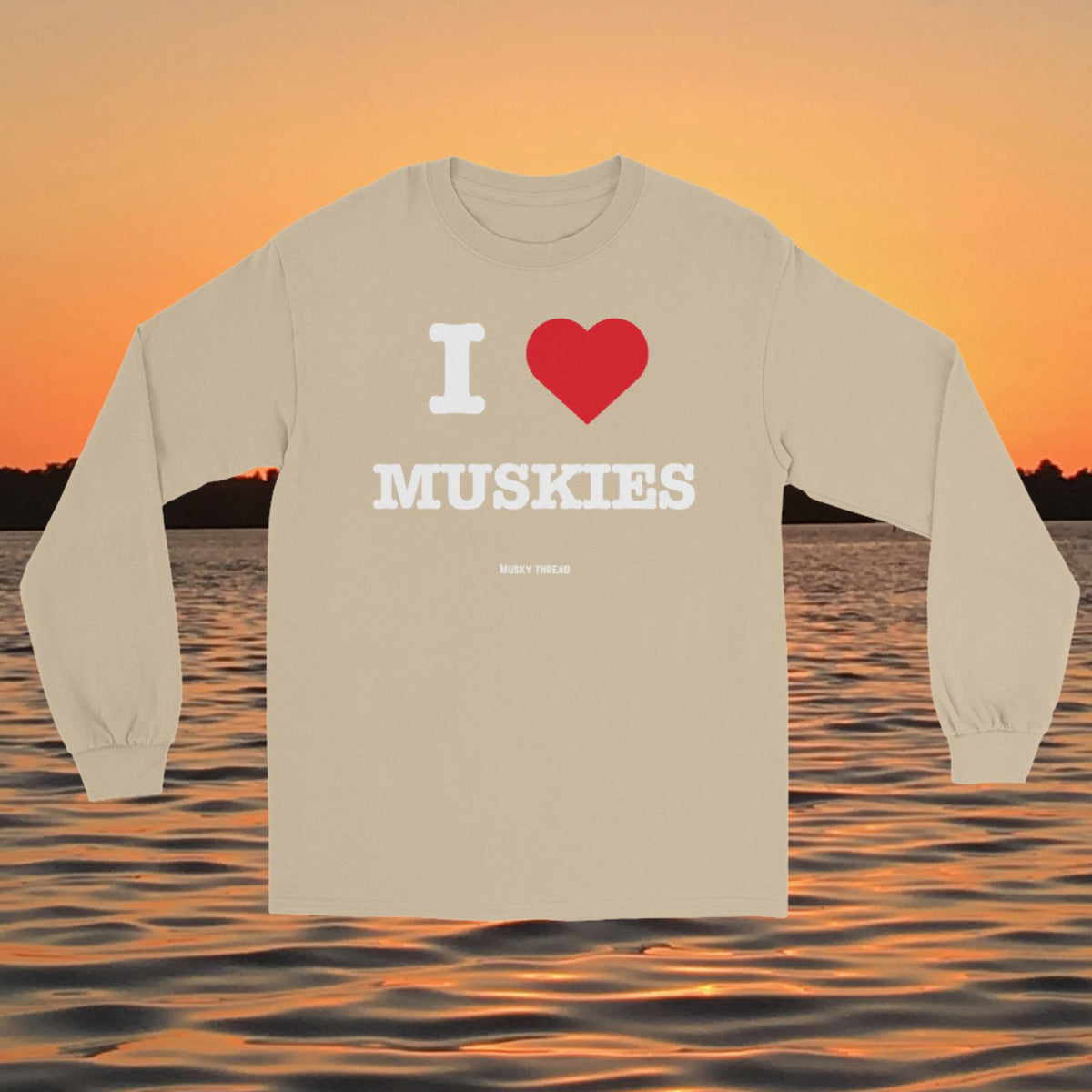 I Love Muskies long sleeve shirt with red heart design over a lake sunset