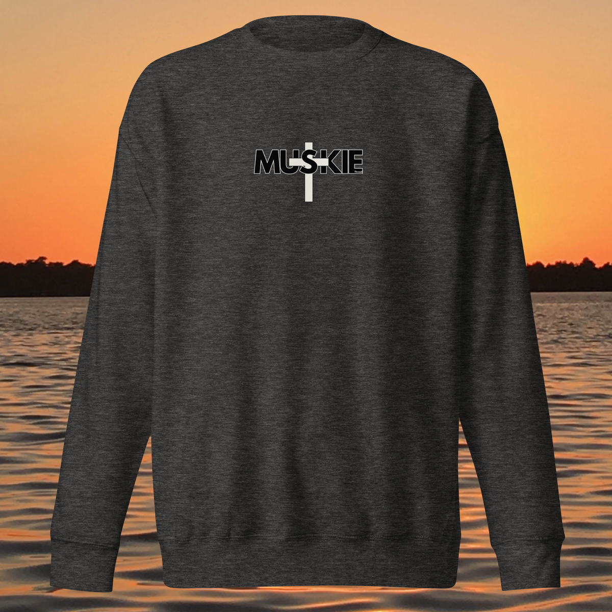 Minimalist Muskie Cross crewneck sweatshirt with black MUSKIE lettering crossed by a cream cross on the chest