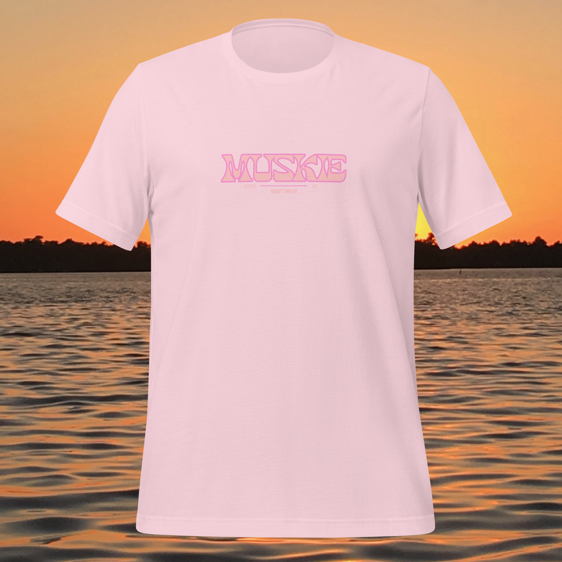 Women’s minimal muskie vibes shirt with clean pink muskie text design on a light tee