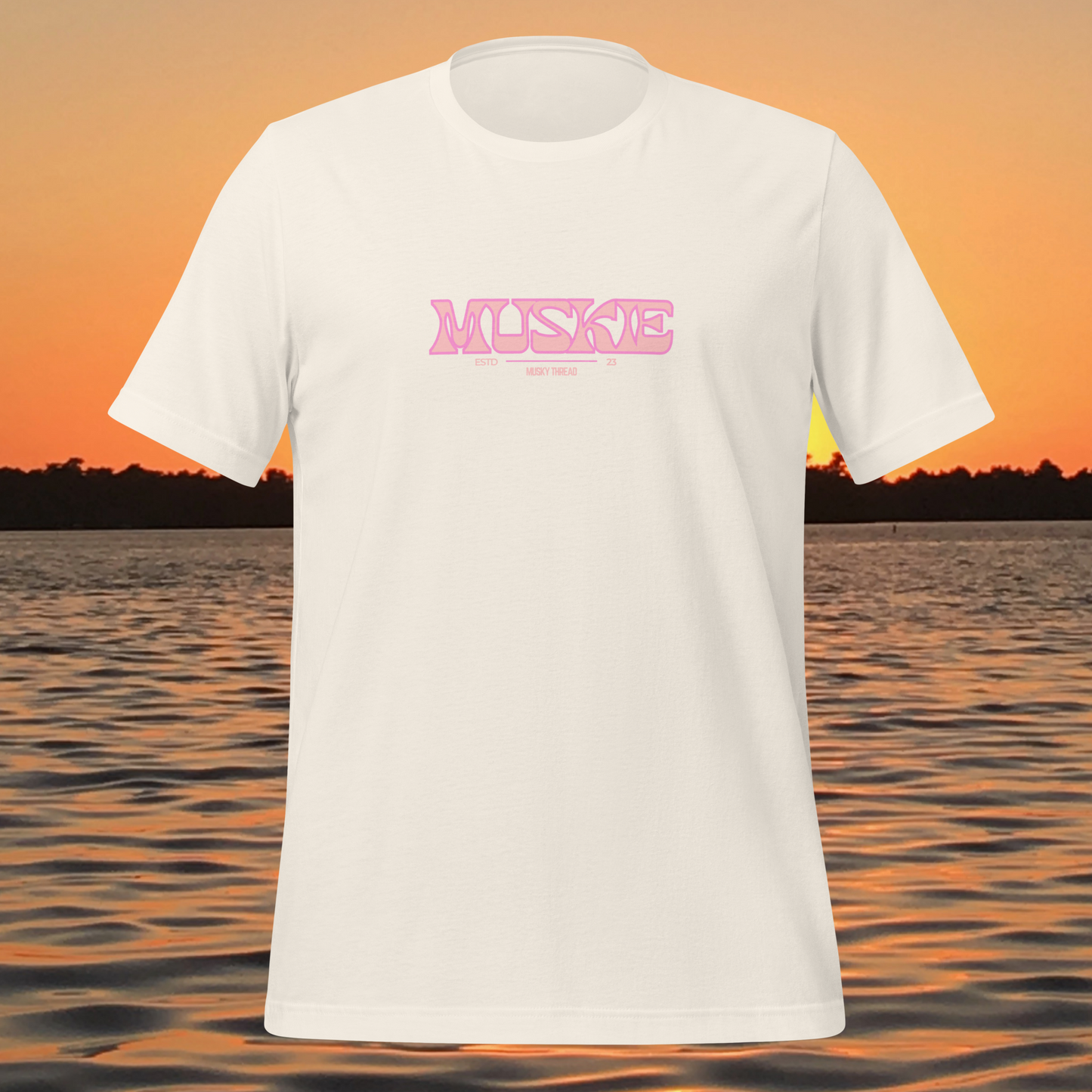 Women’s minimal muskie vibes shirt with clean pink muskie text design on a light tee